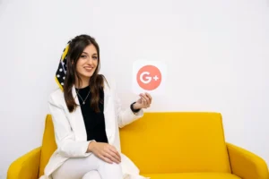 Young businesswoman holding Google Plus icon promoting Google Ads services